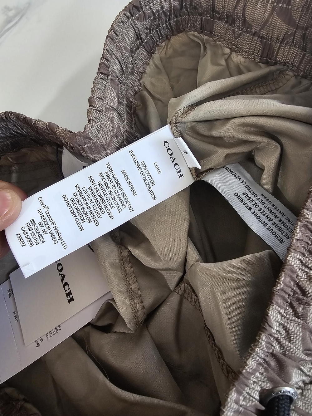 Coach Men’s Signature Swim Trunks — Tan Monogram - Picture 6 of 7